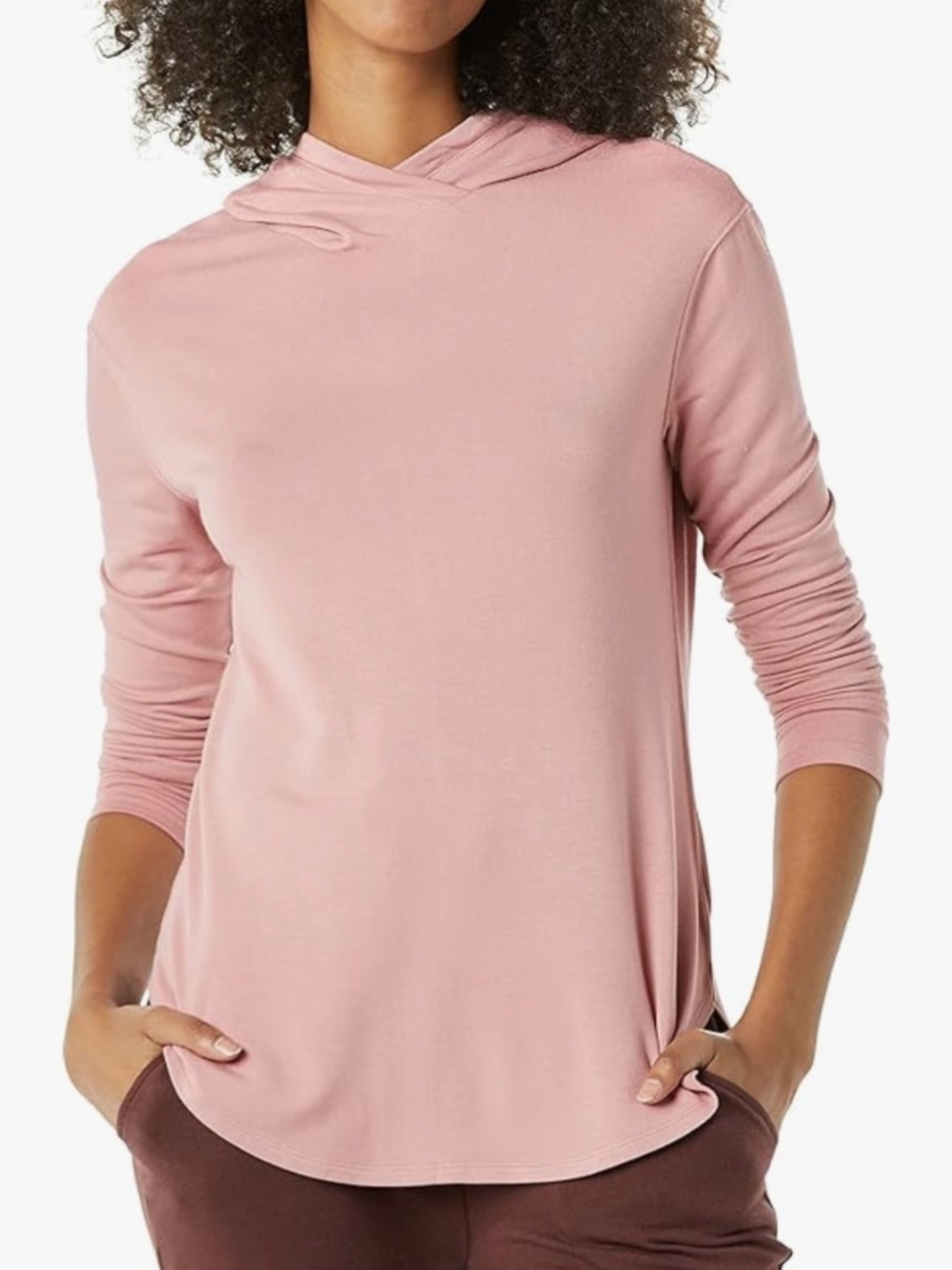 Relaxed-fit dusty pink hooded top with long sleeves. Soft, breathable fabric for